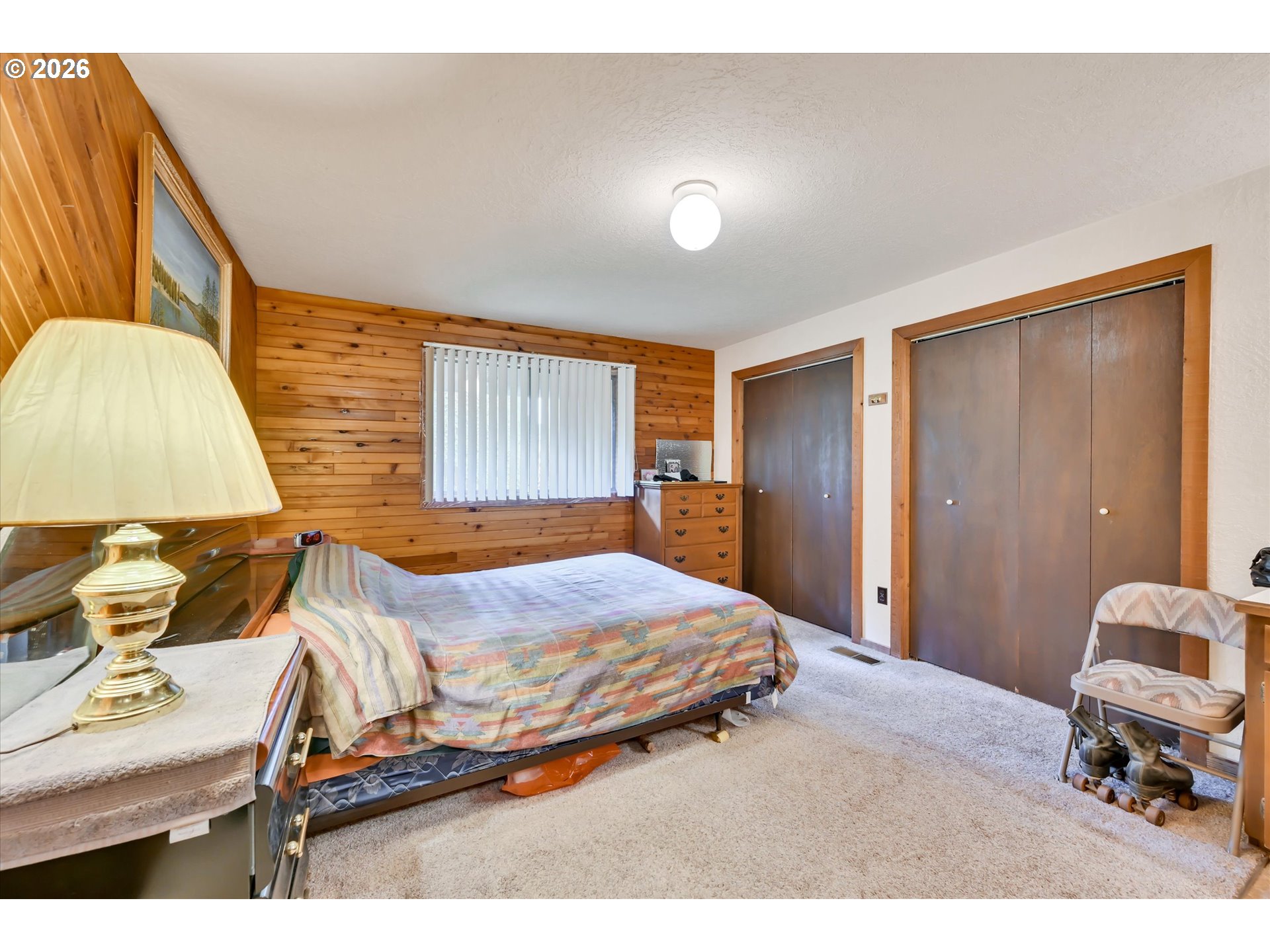 91 Godfrey Road Mossyrock, WA 98564 - Photo 21 of 47 a bedroom with a bed and a couch