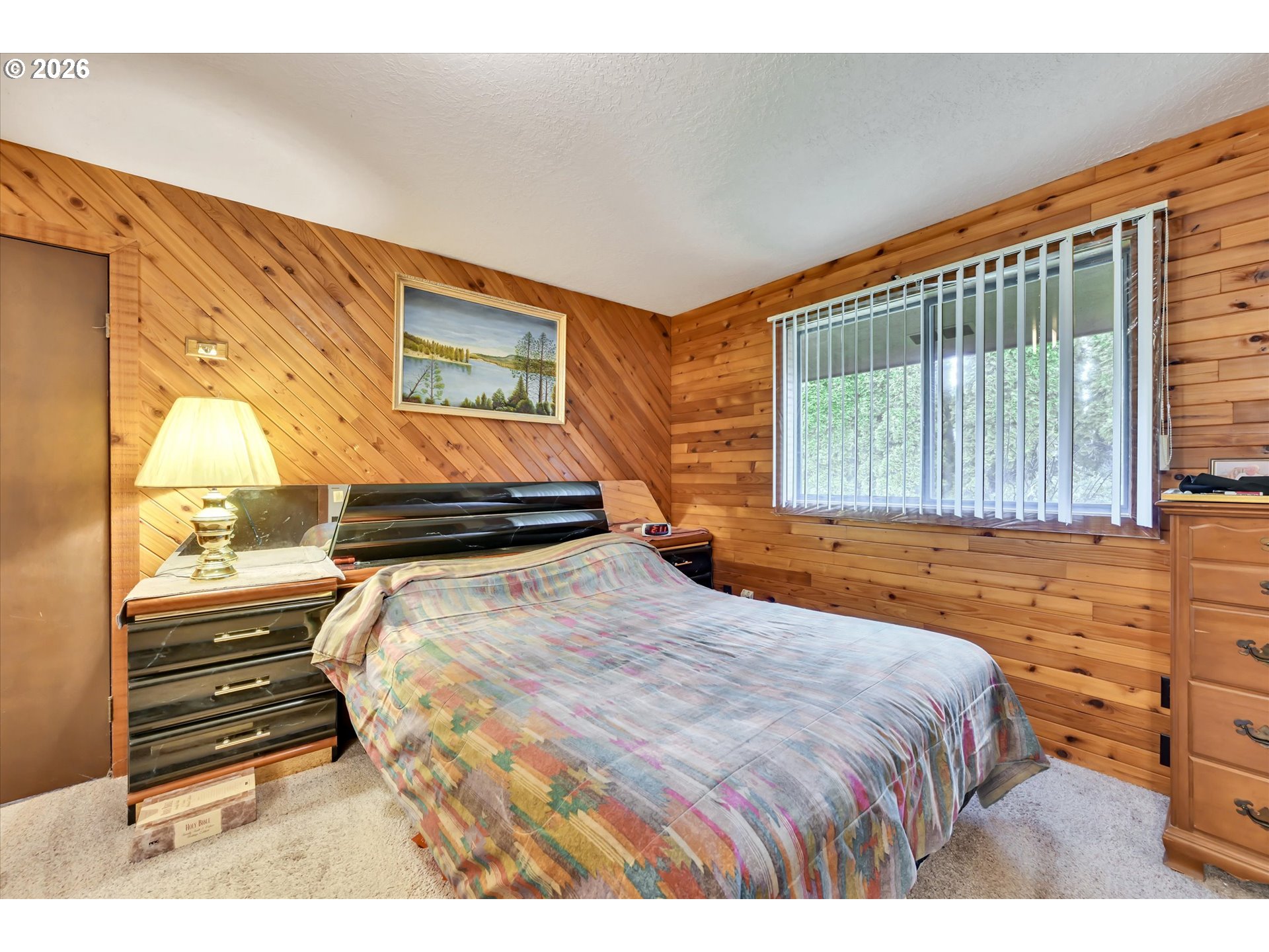 91 Godfrey Road Mossyrock, WA 98564 - Photo 22 of 47 a bedroom with a bed and window