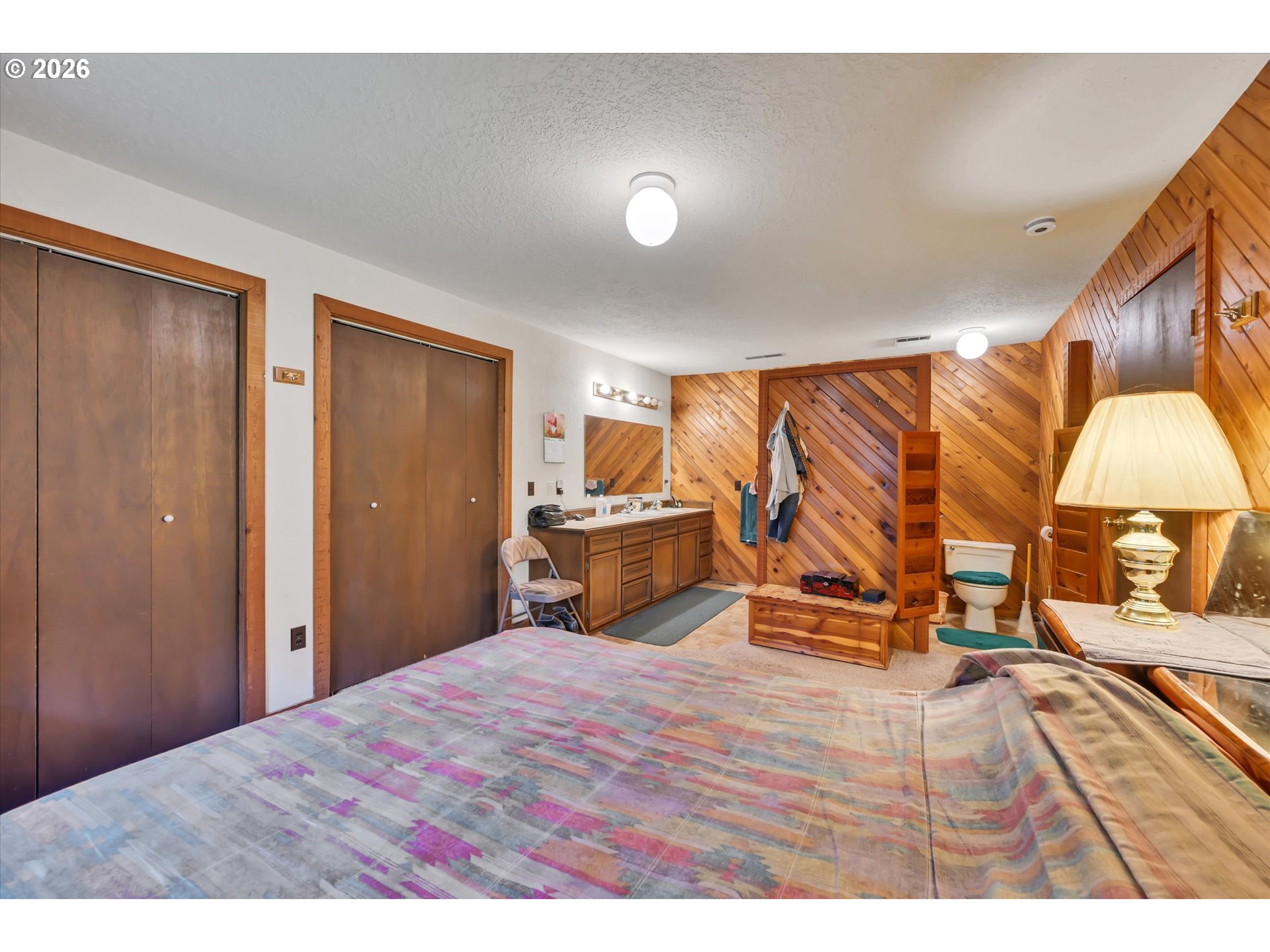 91 Godfrey Road Mossyrock, WA 98564 - Photo 24 of 47 a bedroom with a bed and a view of living room