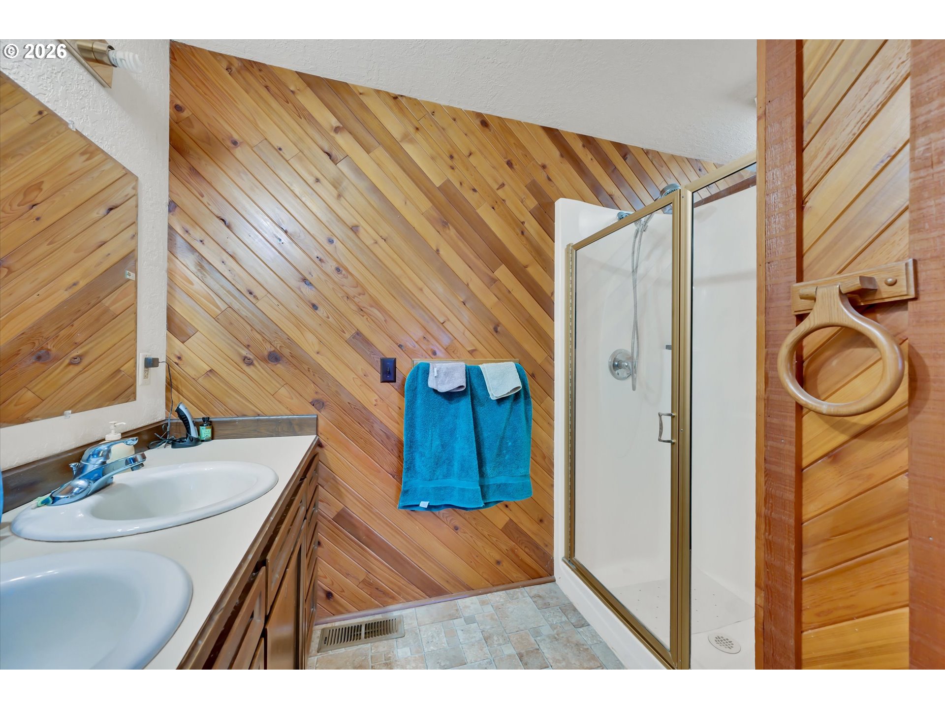 91 Godfrey Road Mossyrock, WA 98564 - Photo 26 of 47 a bathroom with a sink a mirror and a shower
