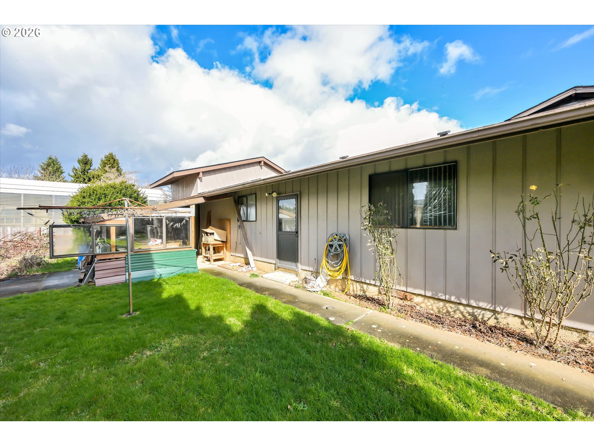 91 Godfrey Road Mossyrock, WA 98564 - Photo 30 of 47 a backyard of a house with table and chairs