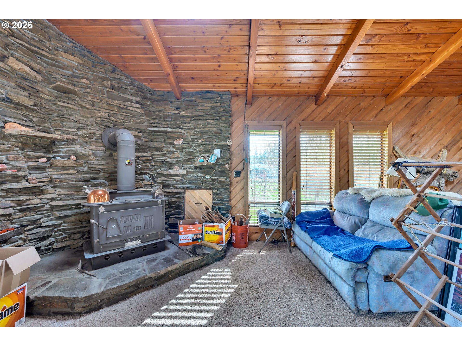 91 Godfrey Road Mossyrock, WA 98564 - Photo 8 of 47 a living room with furniture and a wooden floor