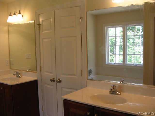 1450 Stavemill Road Powhatan, VA 23139 - Photo 8 of 10 Other - Luxurious Master Bath has his & her vaniti
