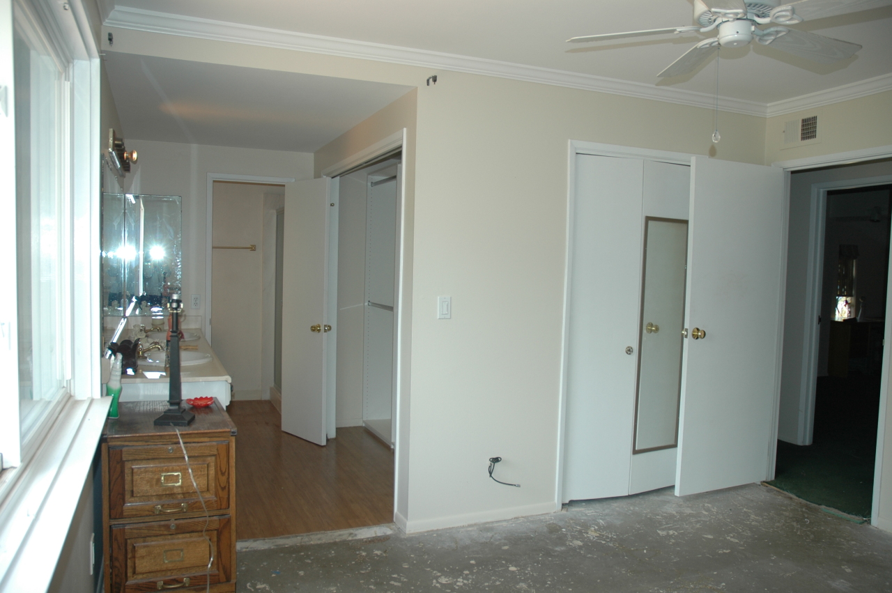 224 Serpolla Drive Carpinteria, CA 93013 - Photo 5 of 11 wooden floor in a hall with a mirror