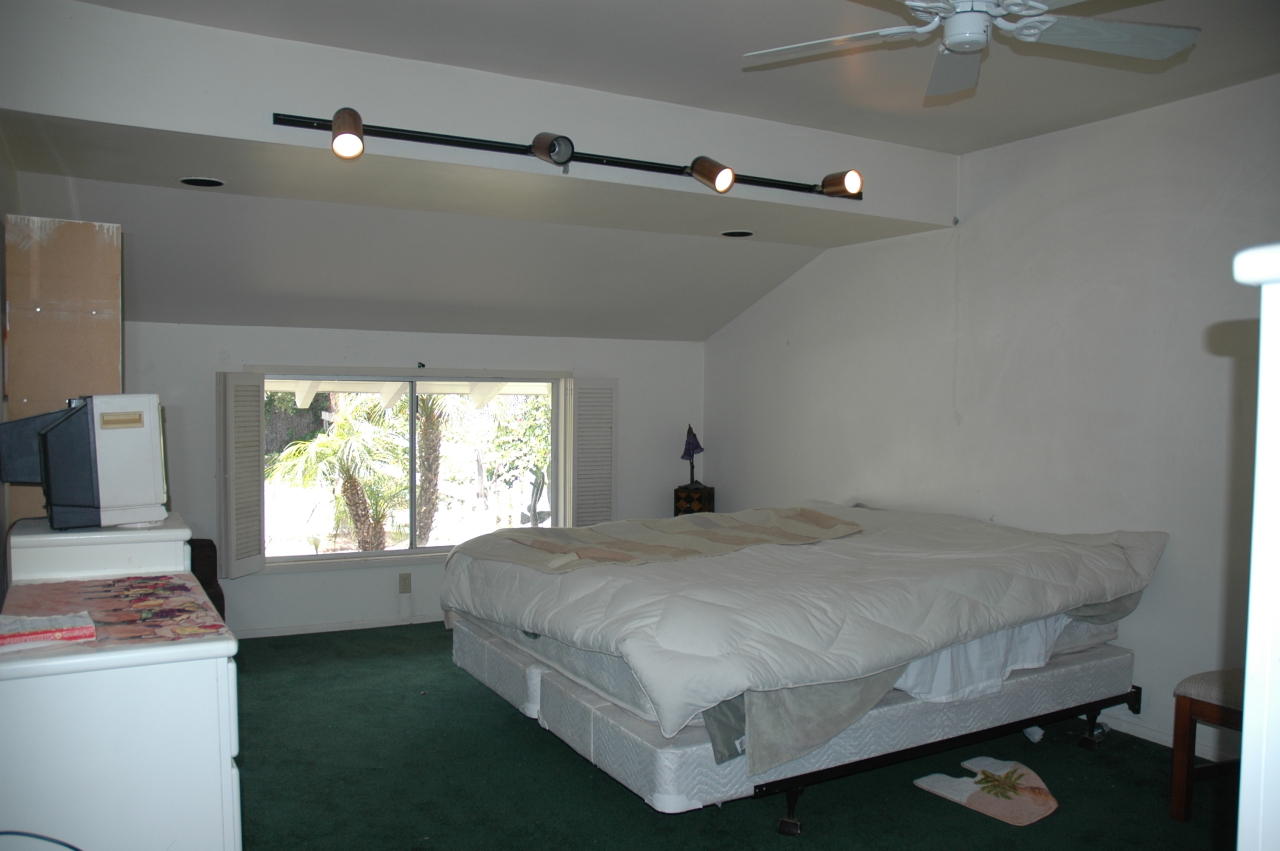 224 Serpolla Drive Carpinteria, CA 93013 - Photo 7 of 11 a bedroom with a bed and a window