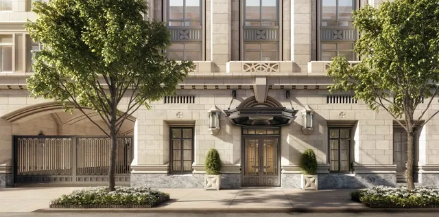 a spacious bedroom with a bed and a chandelier