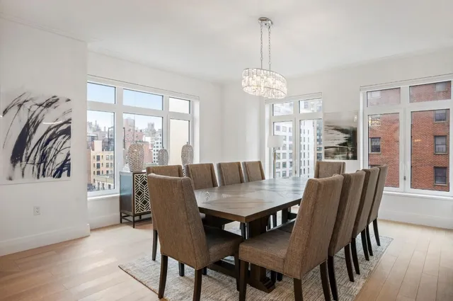 a kitchen with stainless steel appliances granite countertop sink stove top oven and cabinets