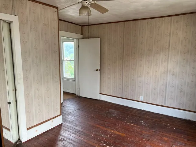 a view of entryway with wooden floor