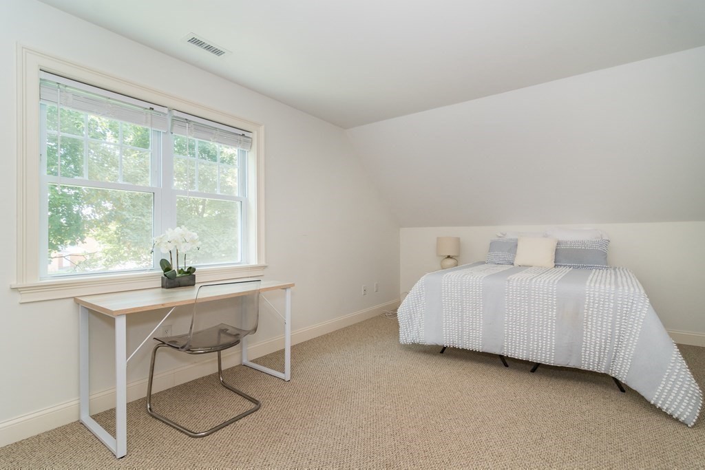 10 Farrant Road Natick, MA 01760 - Photo 14 of 31 a bedroom with a bed and a window