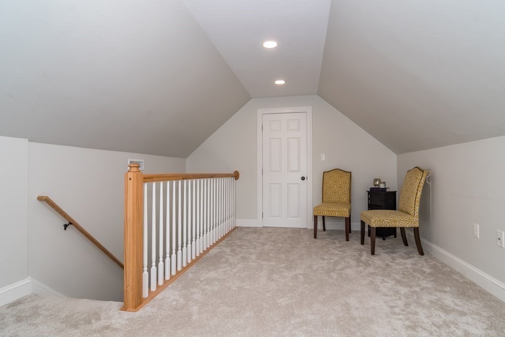 10 Farrant Road Natick, MA 01760 - Photo 21 of 31 a view of a livingroom with furniture and a window