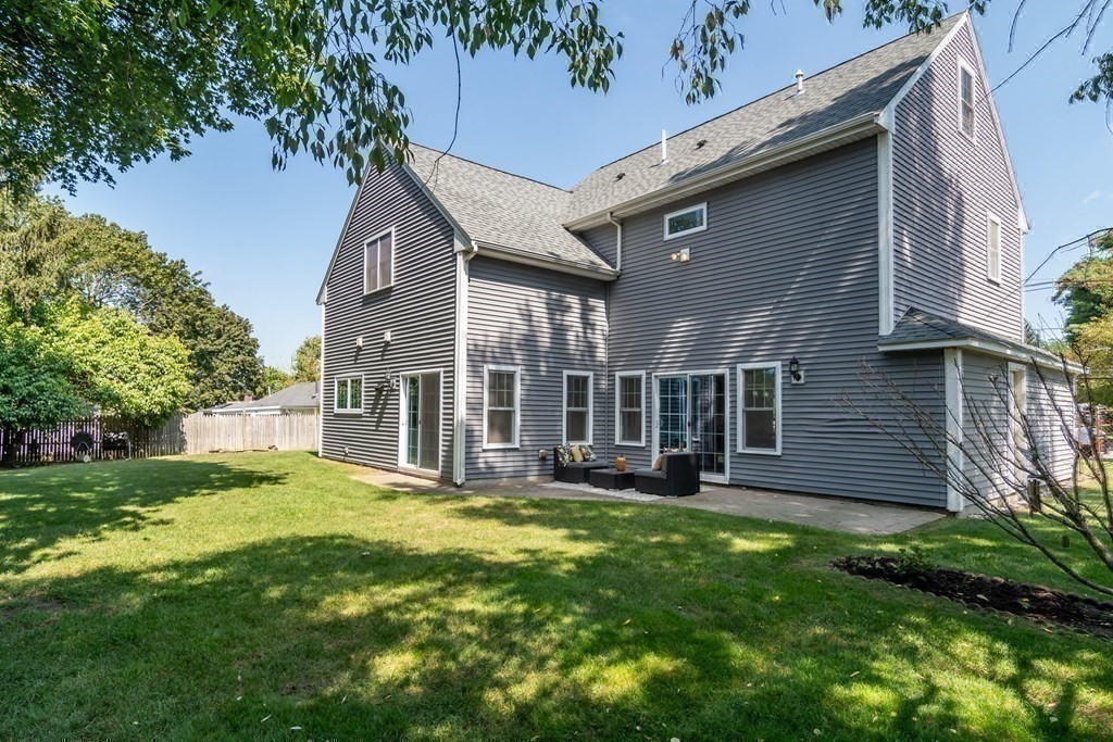10 Farrant Road Natick, MA 01760 - Photo 22 of 31 a view of a house with a yard and sitting area
