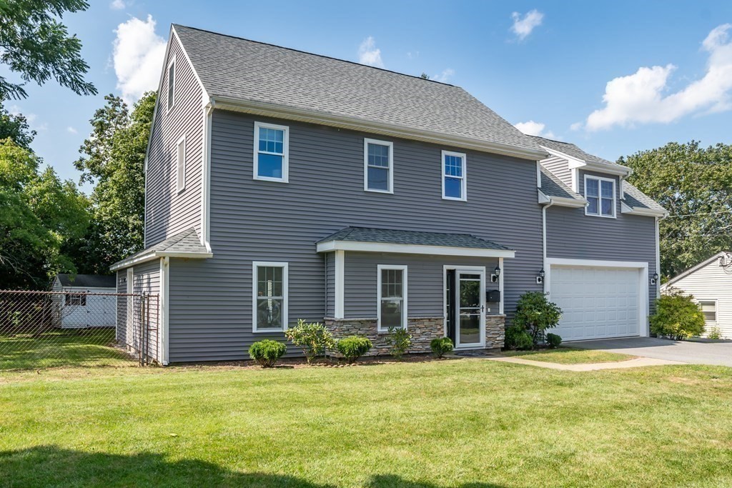 10 Farrant Road Natick, MA 01760 - Photo 26 of 31 a view of a house with a backyard