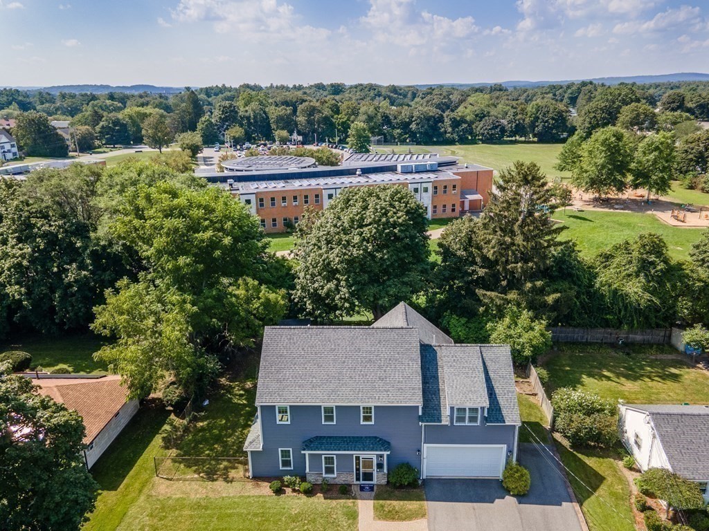 10 Farrant Road Natick, MA 01760 - Photo 28 of 31 an aerial view of a house with a garden and lake view