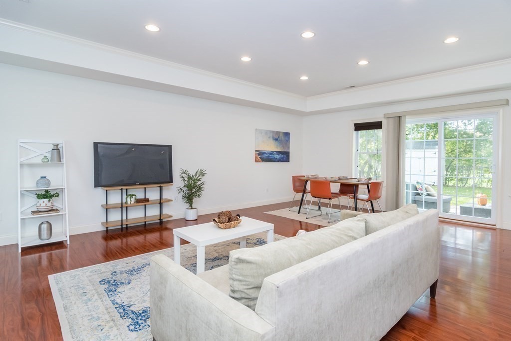 10 Farrant Road Natick, MA 01760 - Photo 5 of 31 a living room with furniture and a flat screen tv
