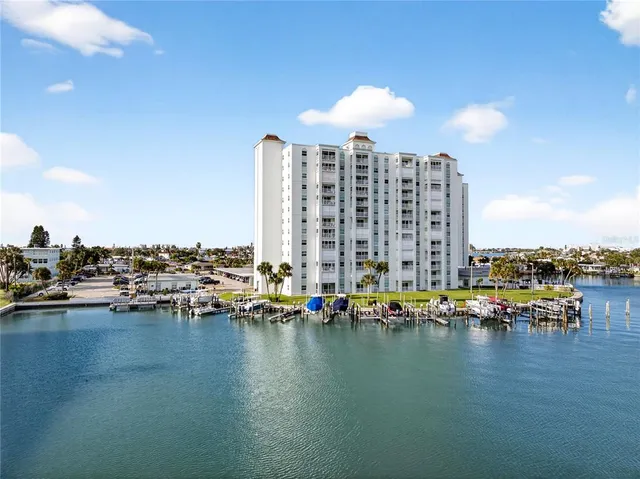 a city view with water view and tall trees