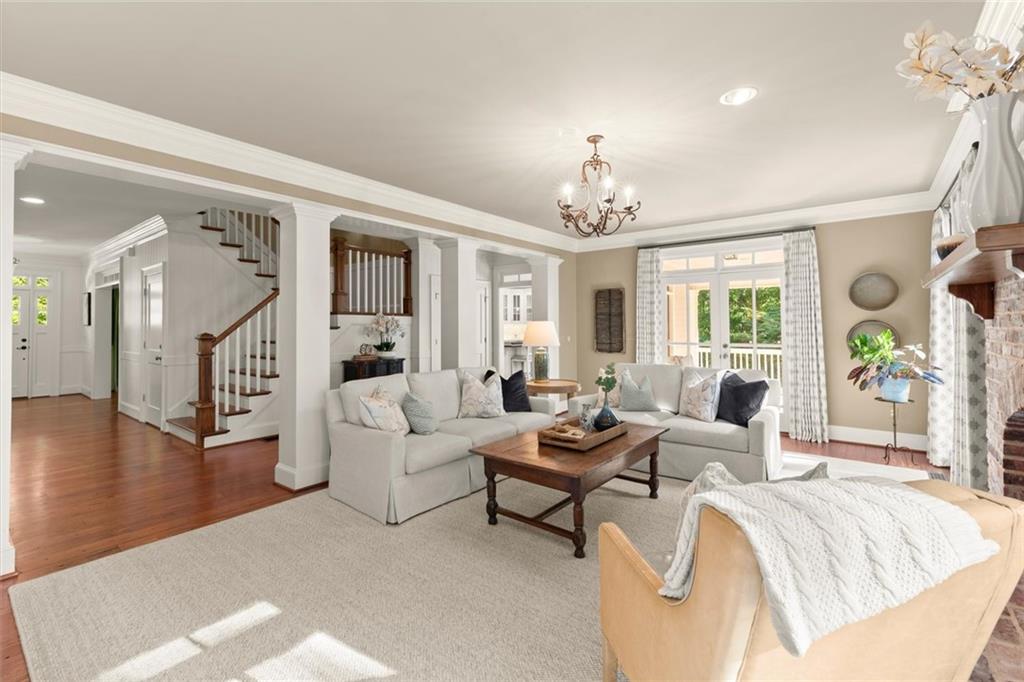 1450 Acworth Due West Road Northwest Kennesaw, GA 30152 - Photo 28 of 77 a living room with furniture and a chandelier