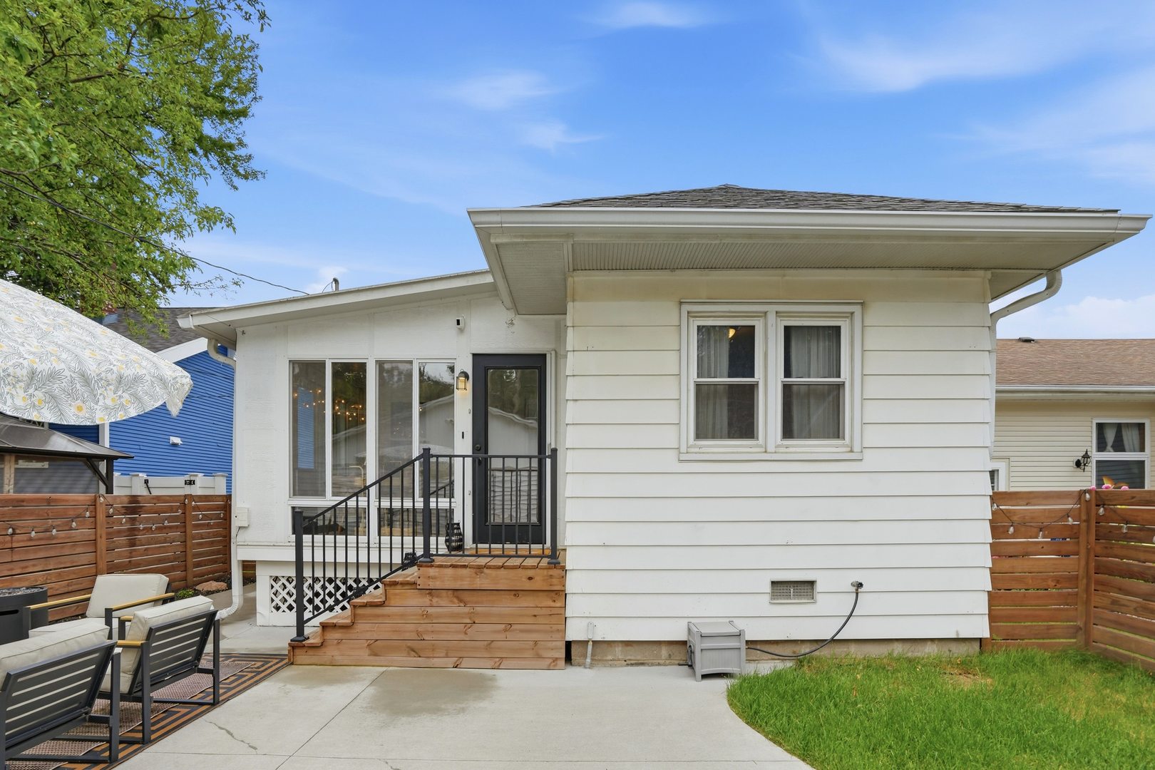 2431 14th Avenue Moline, IL 61265 - Photo 22 of 37 a front view of a house with a garden