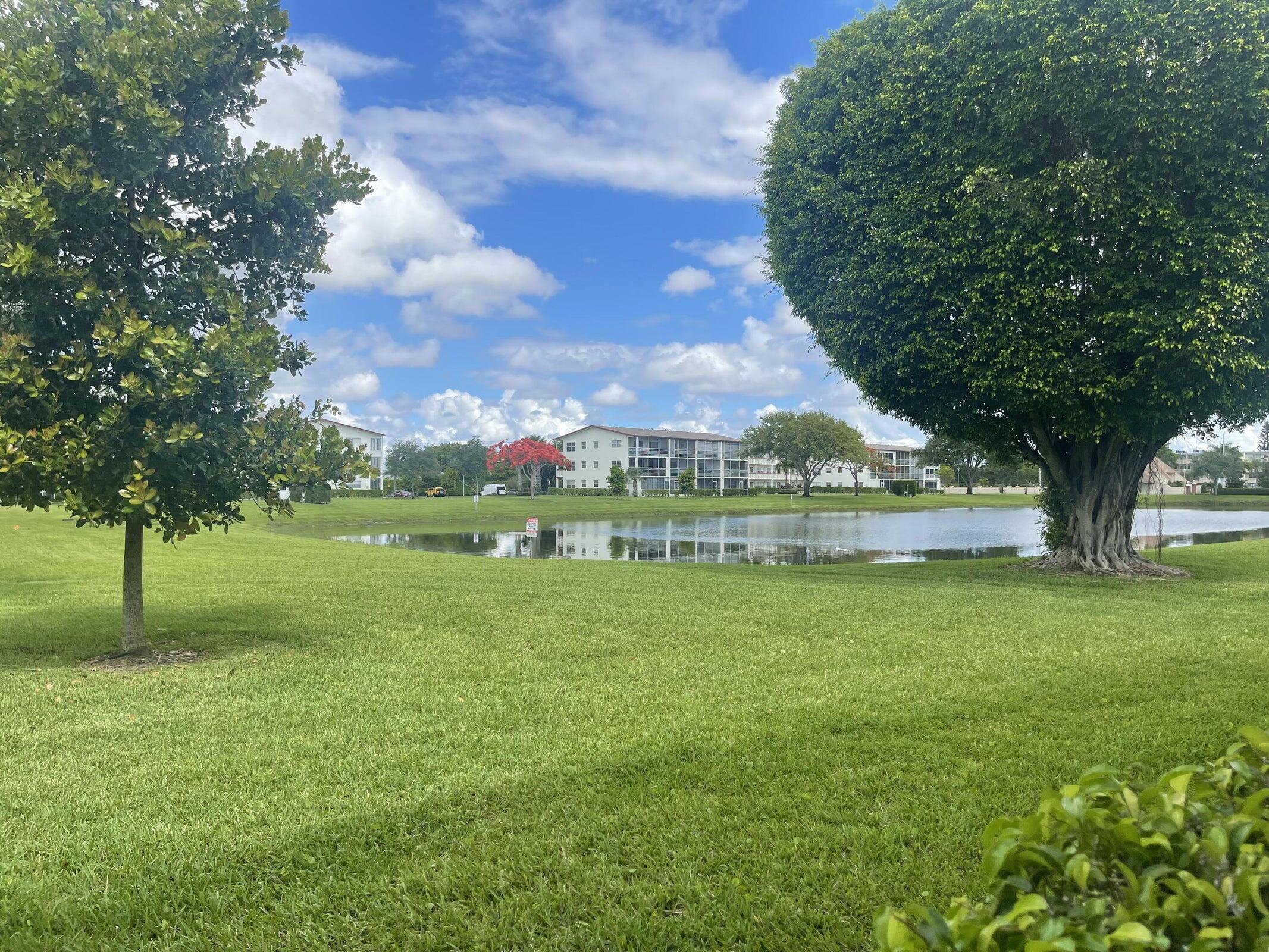 129 Brighton D Boca Raton, FL 33434 - Photo 11 of 11 a view of an outdoor space and a yard