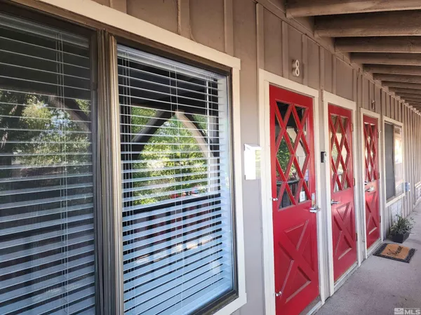 a view of a door and a outdoor space