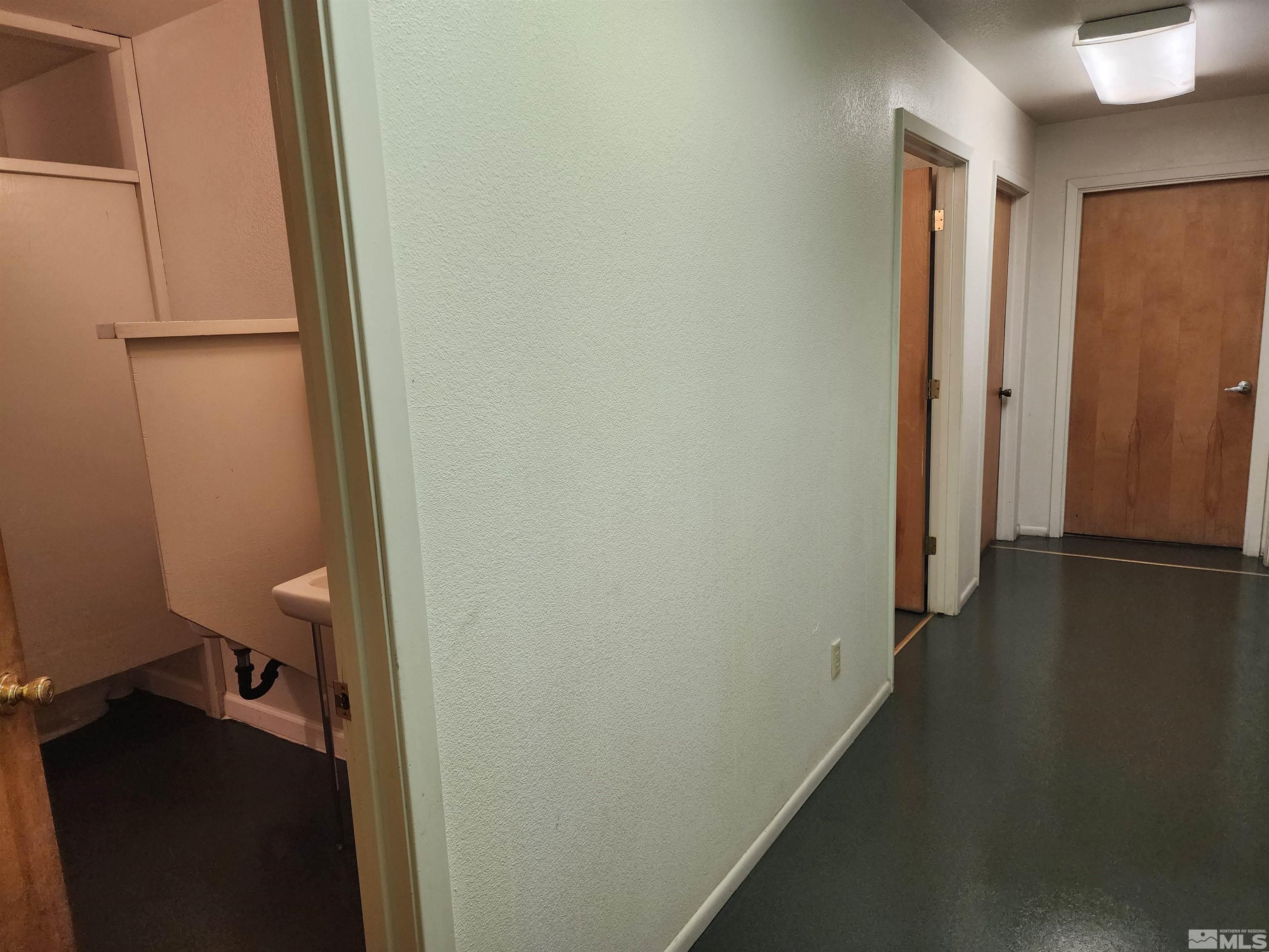 1504 N Highway, Unit 8 Gardnerville, NV 89410 - Photo 7 of 7 a view of a room with wooden floor and a window