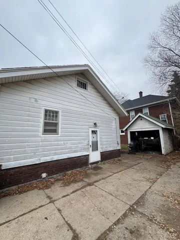 a view of a house with a patio