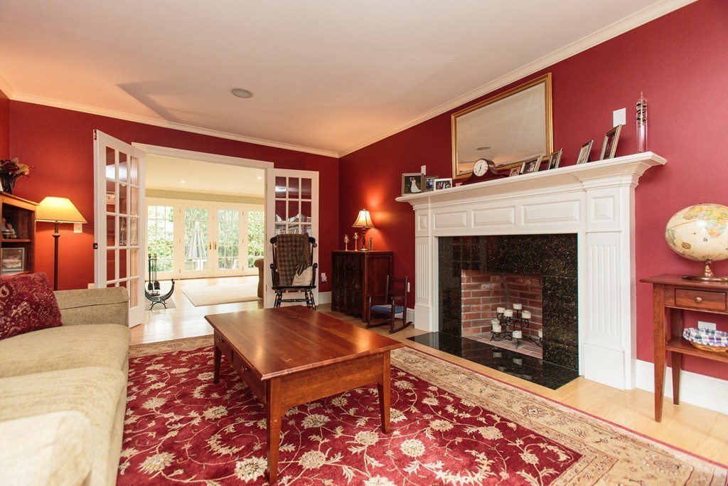 18 Thomas Road Wellesley, MA 02482 - Photo 15 of 24 a living room with furniture and a fireplace