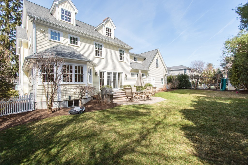 18 Thomas Road Wellesley, MA 02482 - Photo 18 of 24 a view of a house with a yard