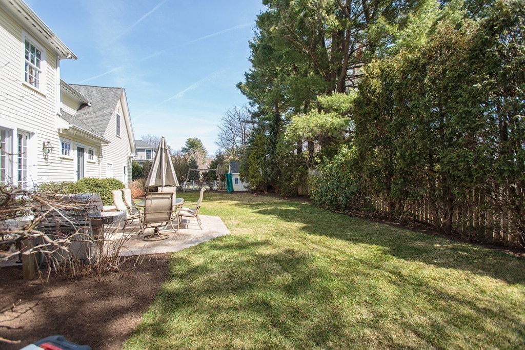 18 Thomas Road Wellesley, MA 02482 - Photo 19 of 24 a view of a chair and tables in the patio