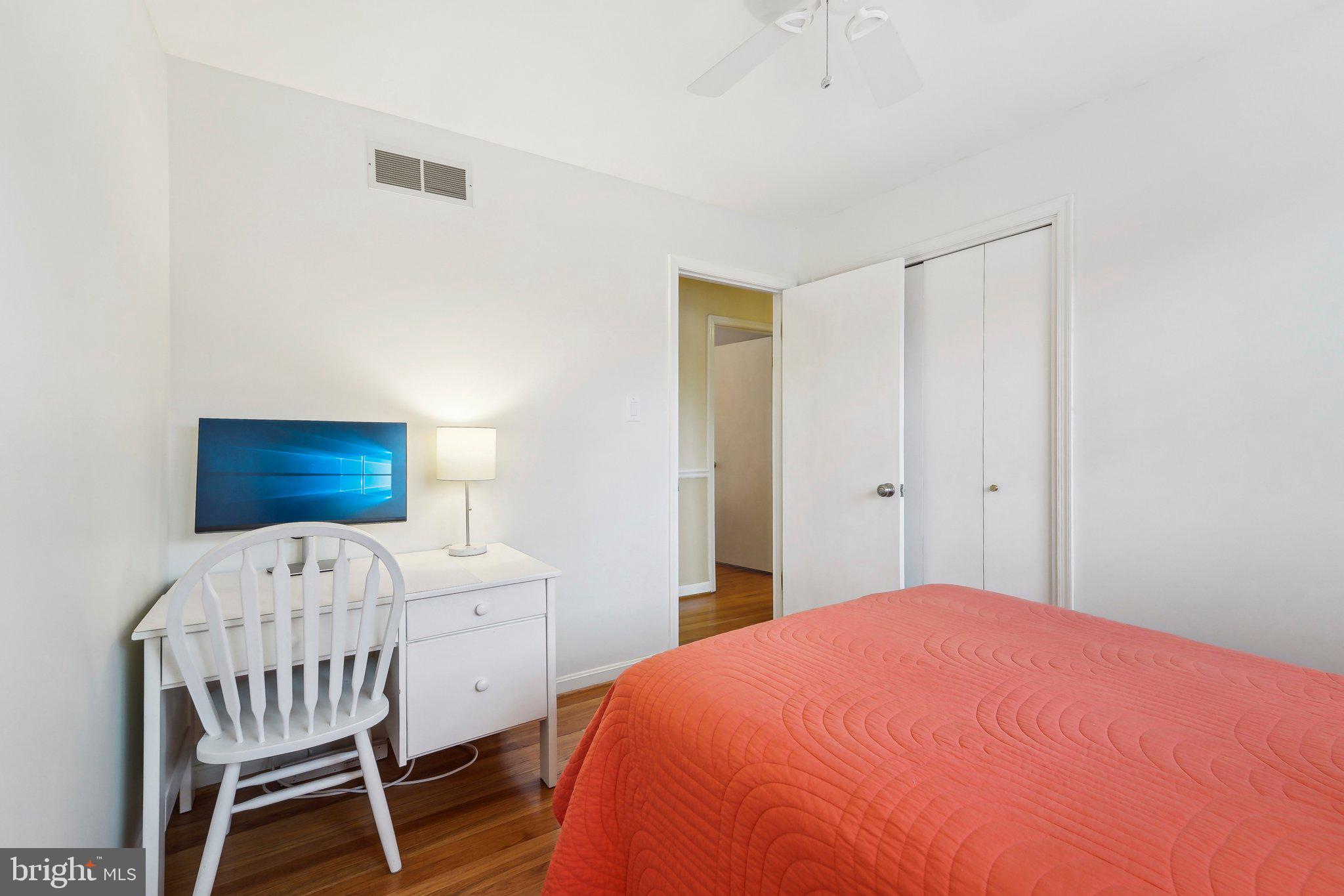 3 Emerson Road Severna Park, MD 21146 - Photo 26 of 65 a bedroom with a bed a chair and a dresser