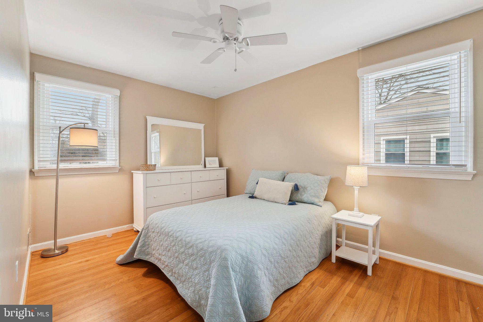 3 Emerson Road Severna Park, MD 21146 - Photo 27 of 65 a bedroom with a bed and wooden floor