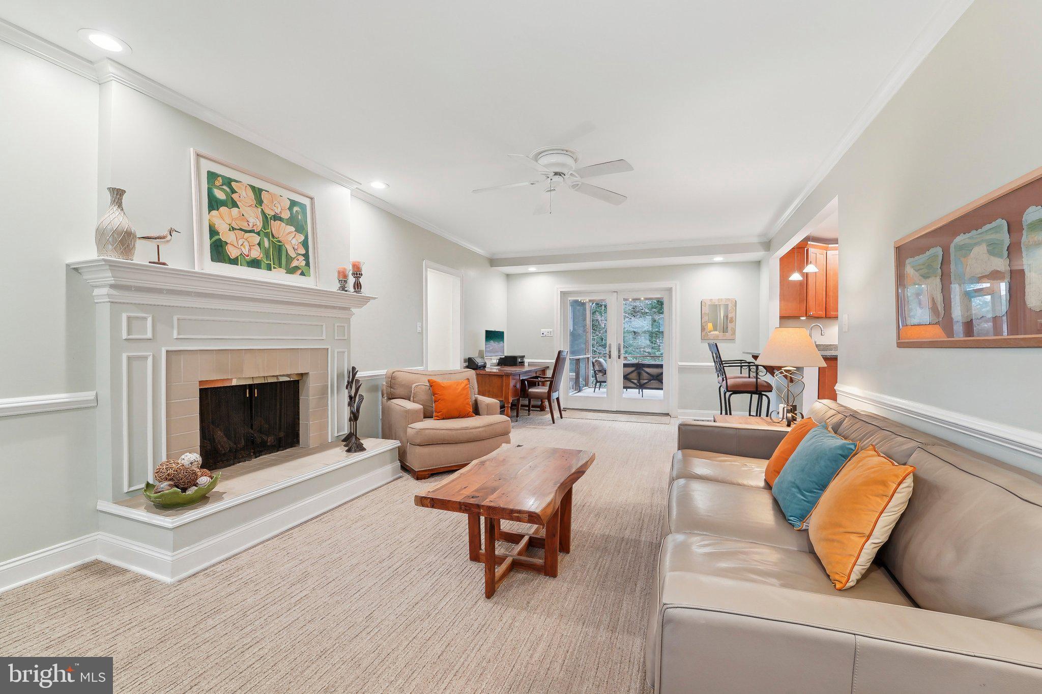 3 Emerson Road Severna Park, MD 21146 - Photo 3 of 65 a living room with furniture and a fireplace