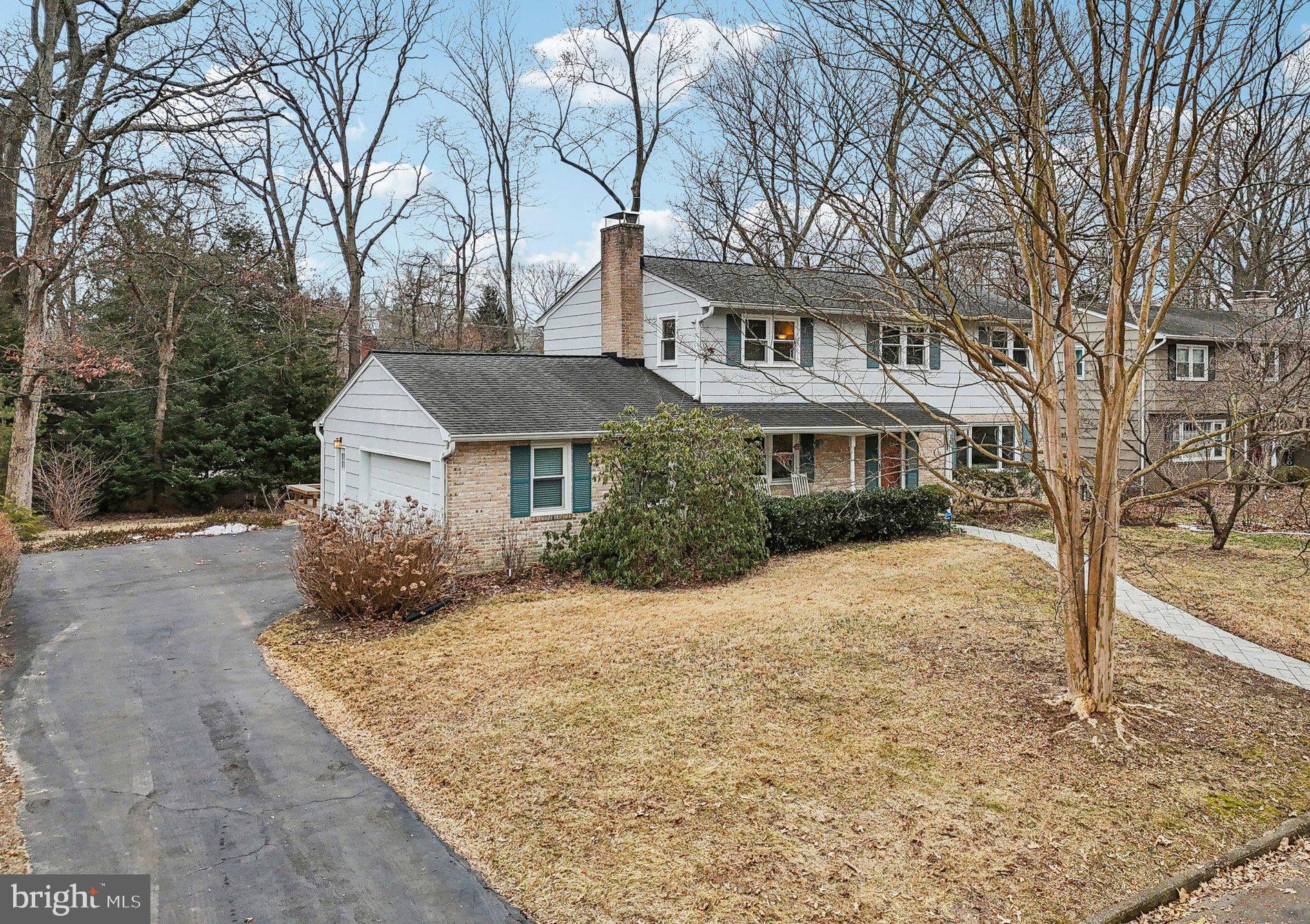 3 Emerson Road Severna Park, MD 21146 - Photo 36 of 65 a front view of a house with a yard covered in snow