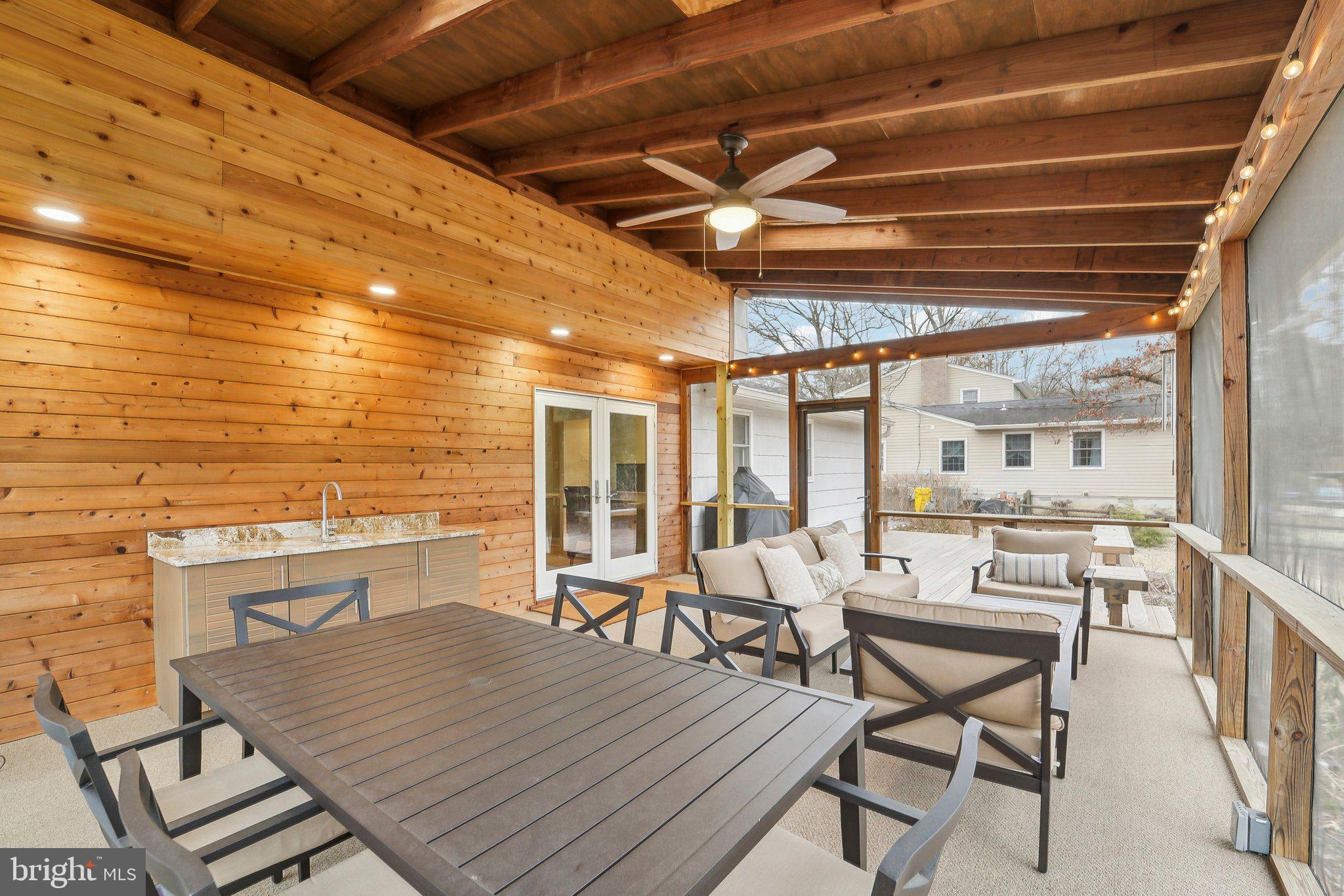 3 Emerson Road Severna Park, MD 21146 - Photo 5 of 65 a view of a dining room with furniture and wooden floor