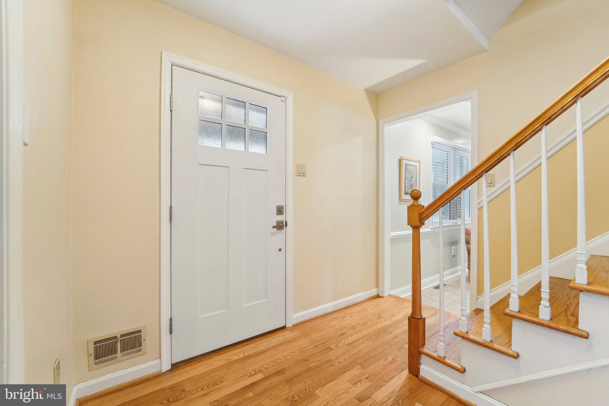 3 Emerson Road Severna Park, MD 21146 - Photo 7 of 65 a view of an entryway with wooden floor