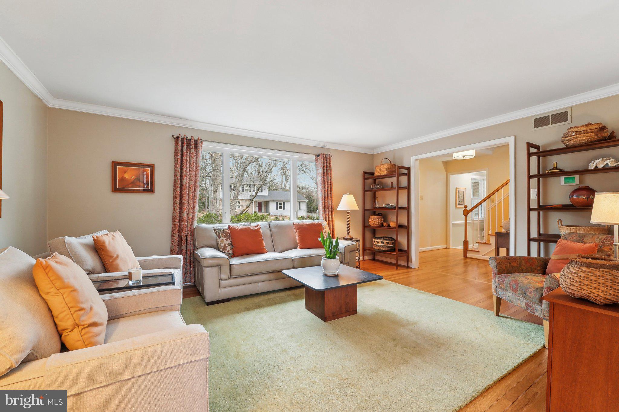 3 Emerson Road Severna Park, MD 21146 - Photo 8 of 65 a living room with furniture and a large window