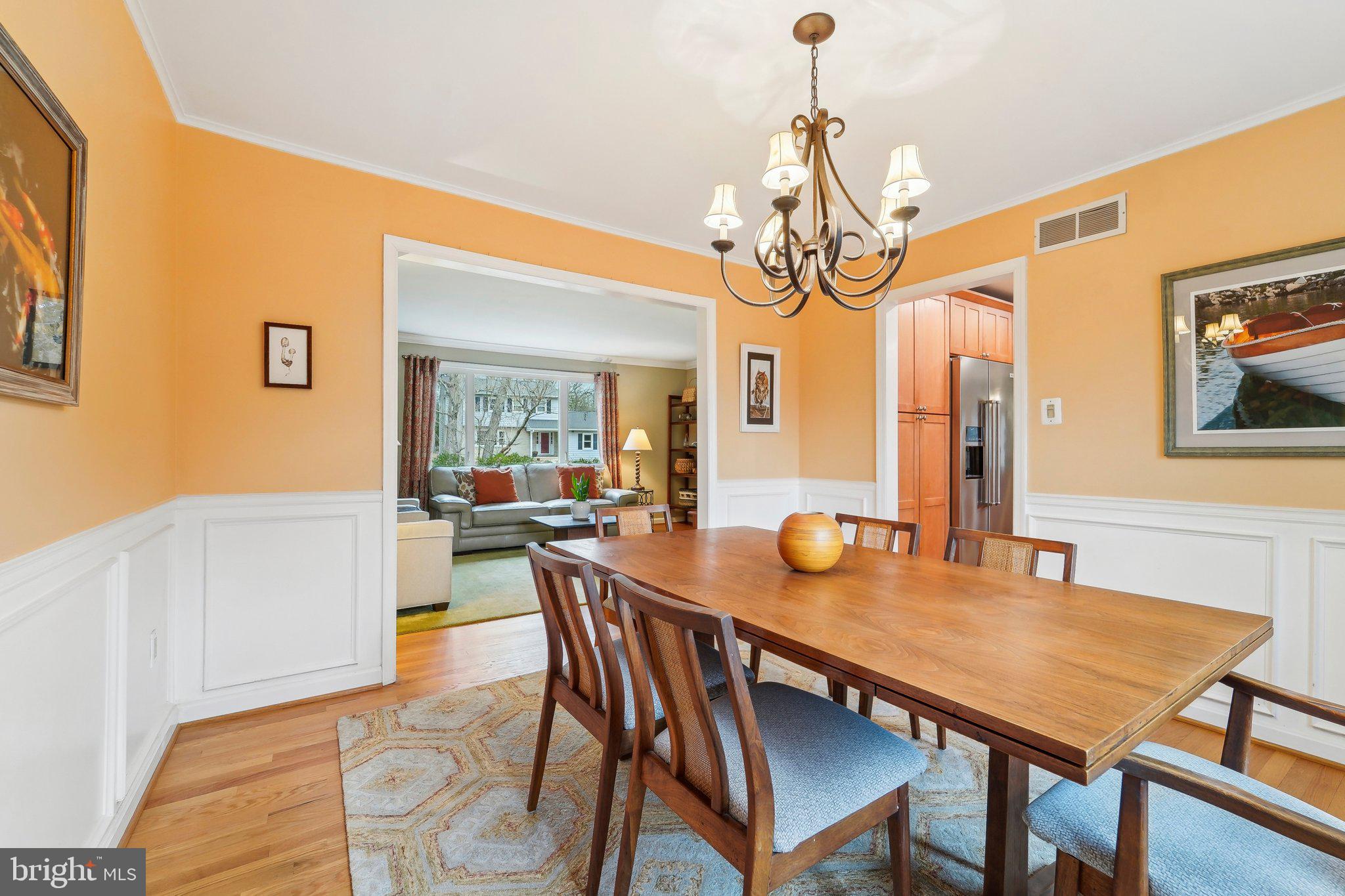 3 Emerson Road Severna Park, MD 21146 - Photo 9 of 65 a view of a dining room with furniture and wooden floor