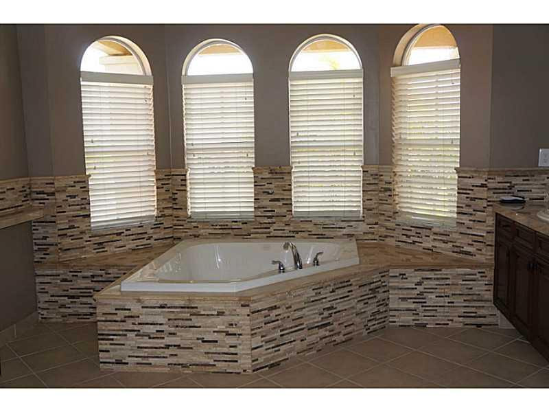 2212 Ridgewood Circle Royal Palm Beach, FL 33411 - Photo 18 of 34 Bathroom Master.