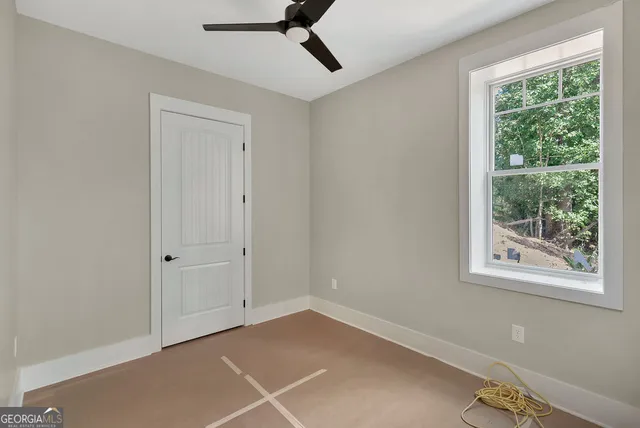 a view of a room with a large window