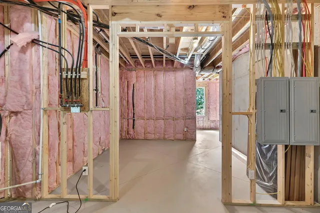 an aerial view of a house with a yard and balcony