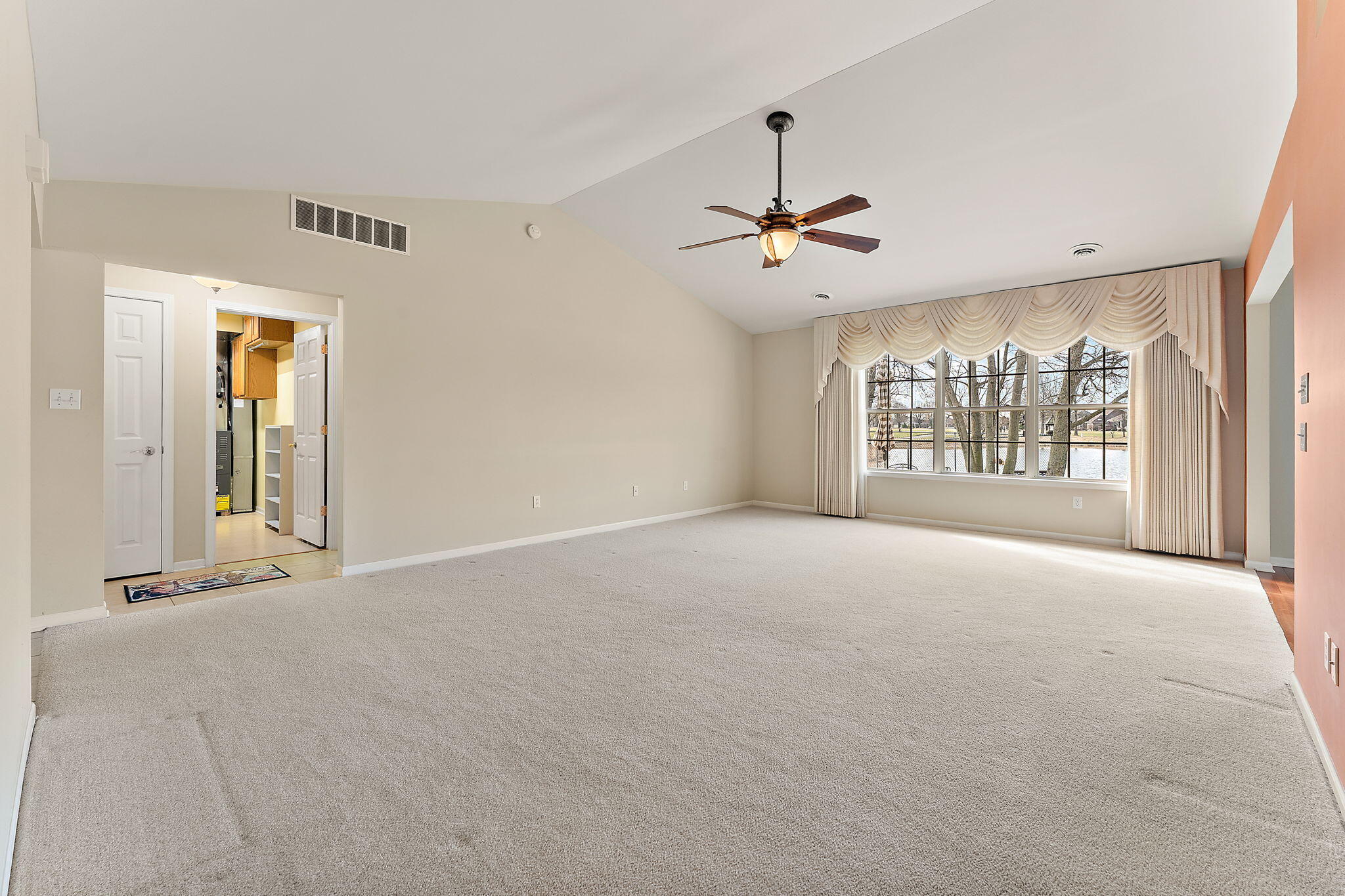 901 Veterans Lane Crown Point, IN 46307 - Photo 7 of 40 a view of an empty room with a window