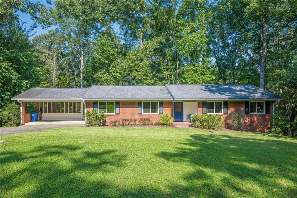 1874 Pinetree Trail Gainesville, GA 30501 - Photo 15 of 15 front view of a house with a garden