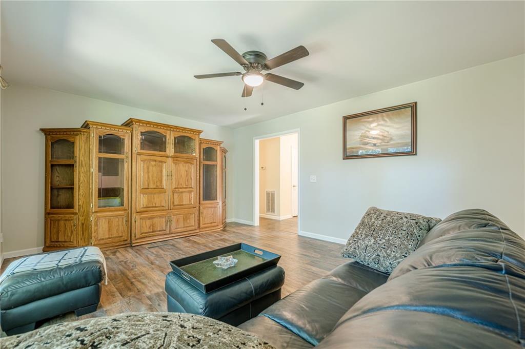1874 Pinetree Trail Gainesville, GA 30501 - Photo 6 of 15 a living room with furniture and a window
