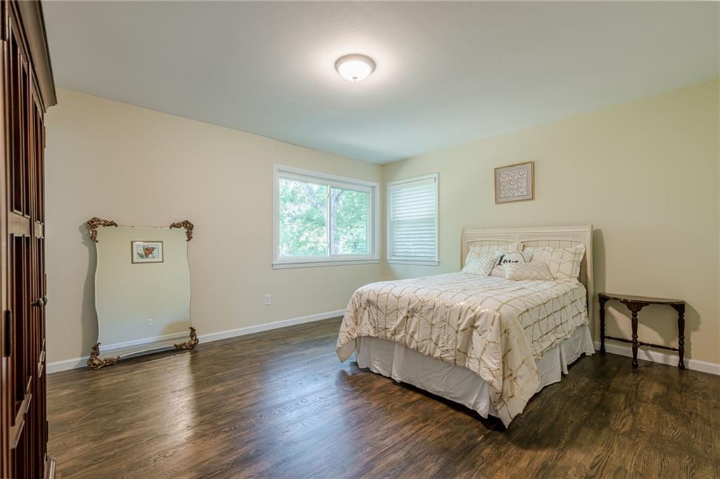 1874 Pinetree Trail Gainesville, GA 30501 - Photo 10 of 15 a bedroom with a bed and a window