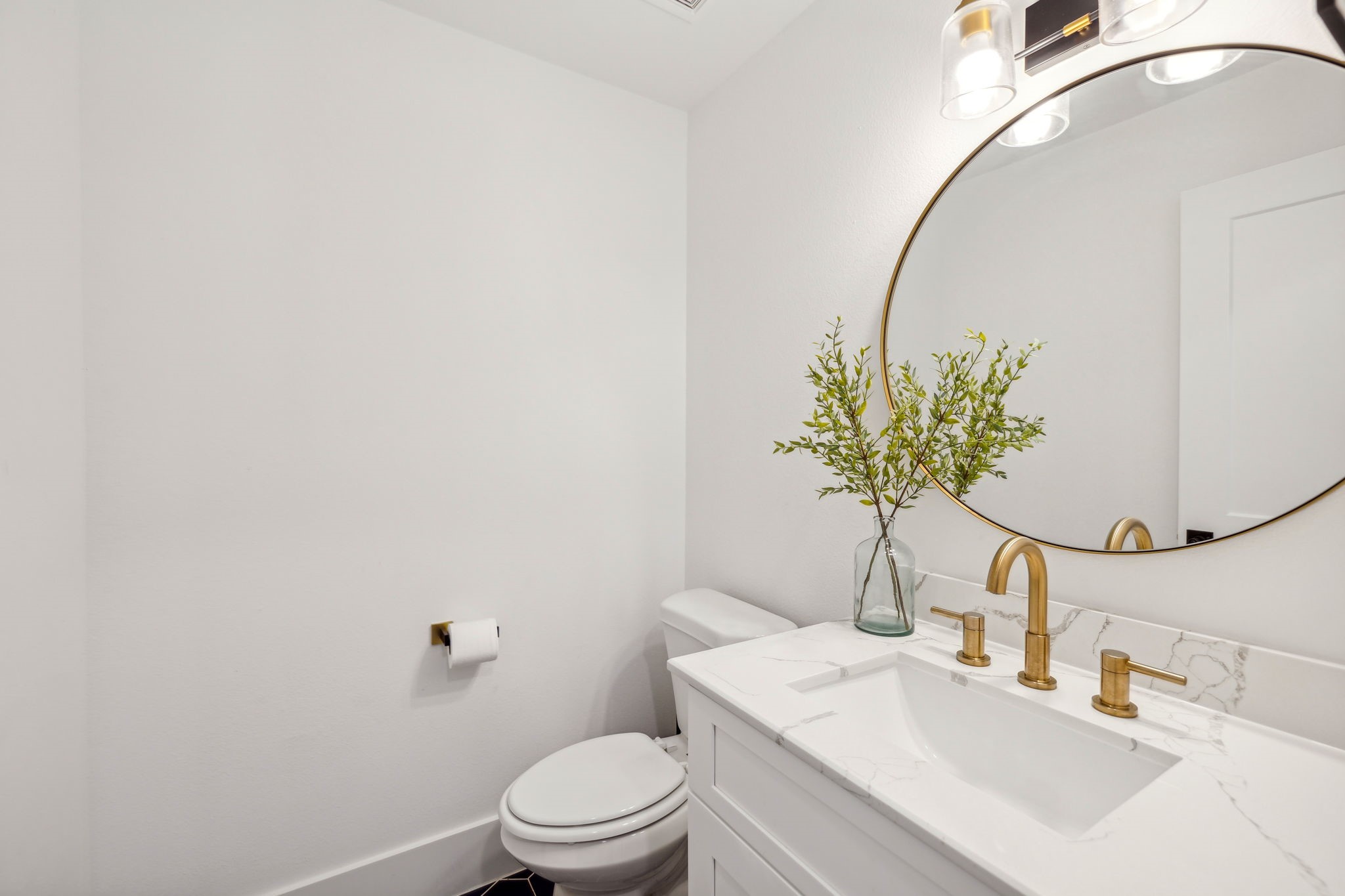 1413 West 23rd Street Houston, TX 77008 - Photo 22 of 39 a bathroom with a sink a toilet and a mirror