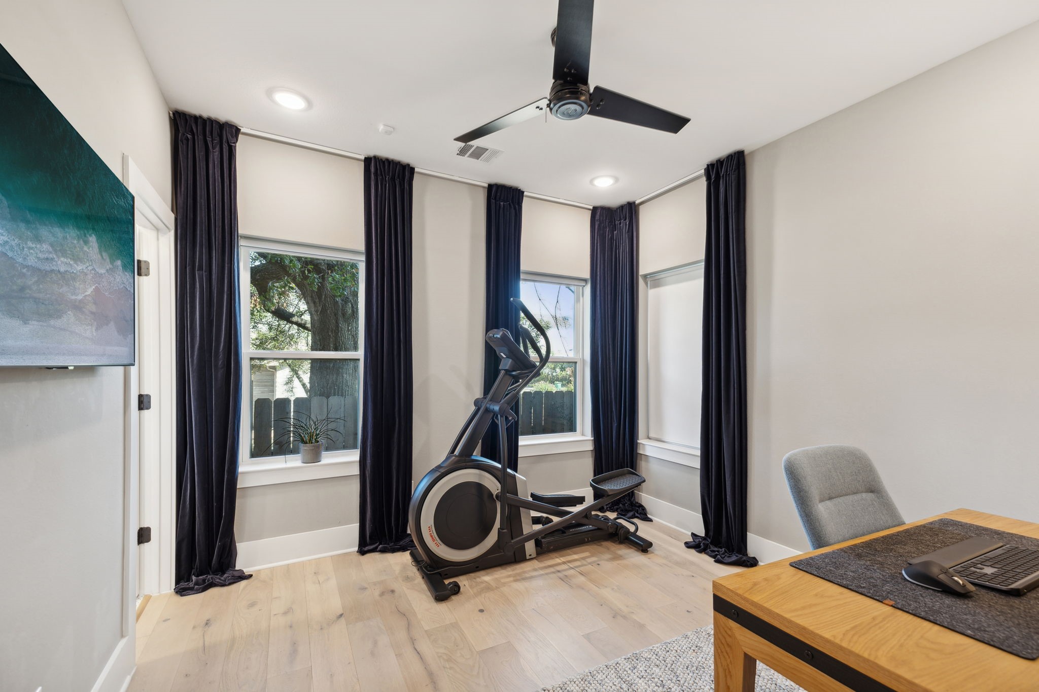 1413 West 23rd Street Houston, TX 77008 - Photo 7 of 39 a view of a room with gym equipment