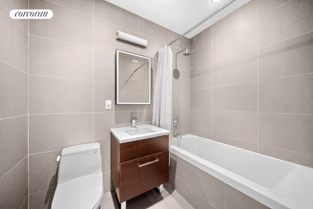 a view of a terrace with couches and lounge chairs