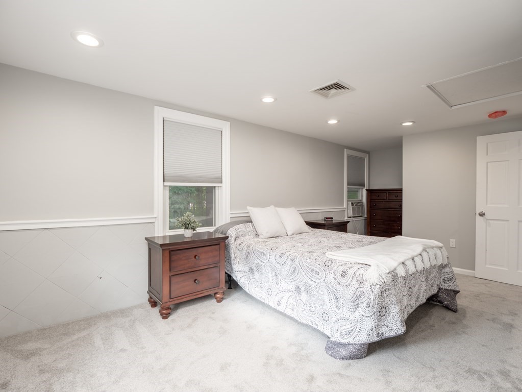 82 Rangeway Road Billerica, MA 01862 - Photo 11 of 40 a bedroom with a bed and a window