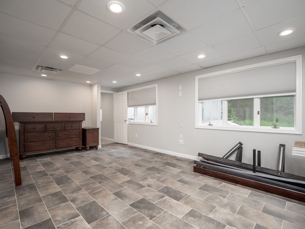 82 Rangeway Road Billerica, MA 01862 - Photo 20 of 40 a view of front door with wooden floor and furniture