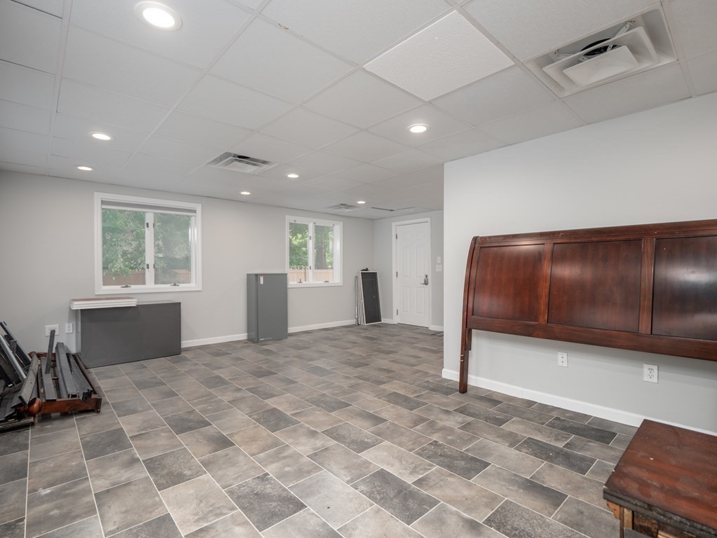 82 Rangeway Road Billerica, MA 01862 - Photo 22 of 40 a view of a livingroom with furniture and windows