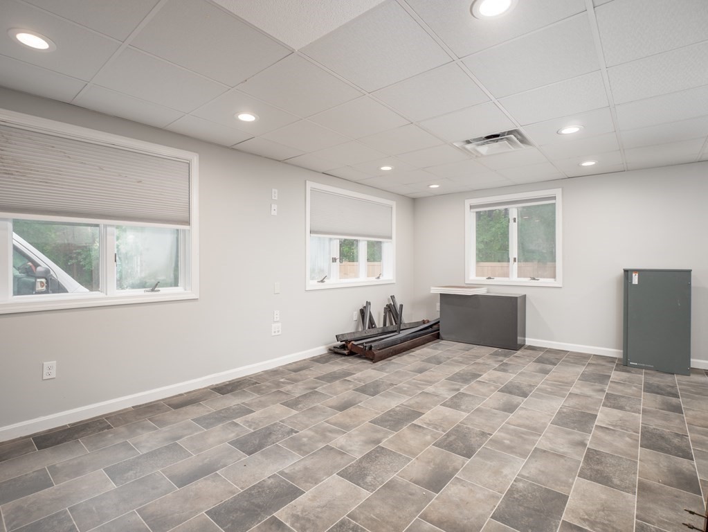 82 Rangeway Road Billerica, MA 01862 - Photo 23 of 40 a view of work space with window and wooden floor